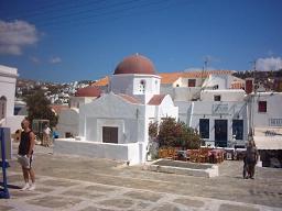 Mykonos Town (Chora) harbour with fishing boats and whitewashed houses, Mykonos, Cyclades, Greece